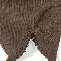 Close-up of the Hand Knit Snug Hat in brown, featuring a soft, fluffy, fleece-like lining and irregular edges, displayed against a white background.