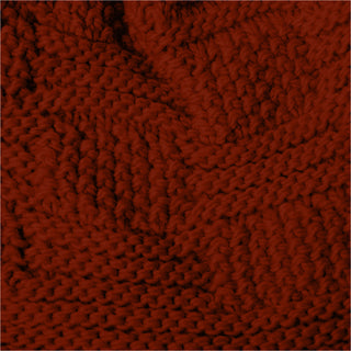 Close-up of the red Hand Knit Sena Hat, featuring thick yarn and a textured pattern with interlocking loops and ridges. The stitching forms a repeating geometric design, embodying the cozy warmth and handmade charm perfect for winter wear.