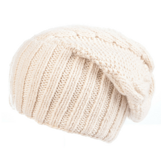 A white Oversized Cable Merino Slouch beanie on a white background.