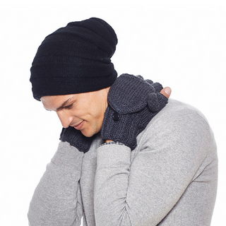 A man wearing a Stripe Tube Slouch beanie and mittens.