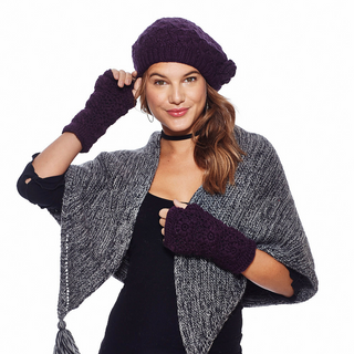A woman posing with a smile, wearing a Say It With a Rose beret hat and matching fingerless gloves, a black top, a choker, and a gray cardigan.