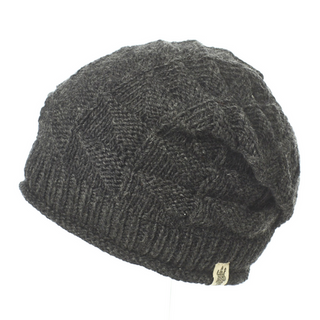 A black Wave Slouch beanie made from organic cotton on a mannequin.
