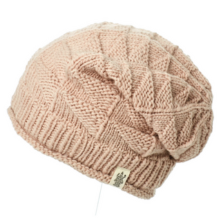 The Wave Slouch women's cable knit beanie made from organic cotton.