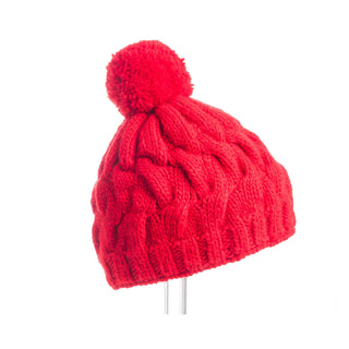 A red knitted Dante Beanie with Pom with a fleece band lining and a pompom on top, displayed on a stand against a white background.