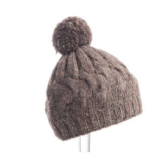 A brown Dante Beanie with Pom, displayed on a stand against a white background.