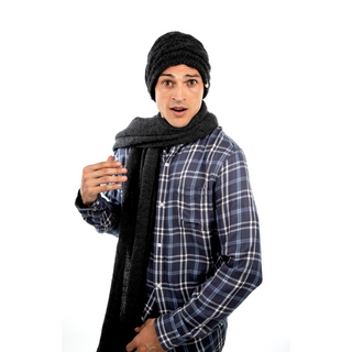 A young man in a plaid shirt and Triple Braid Cable Slouch scarf.