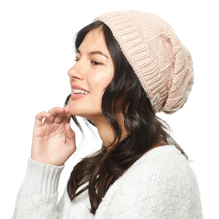 A woman wearing a Wave Slouch beanie.