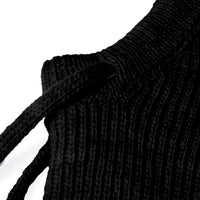 Close-up of the Hand Knit Cozy Hood in black ribbed fabric, showcasing a drawstring threaded through a stitched opening. The plain white background highlights the hood’s textured knit and subtle hints of sherpa fleece lining add to its cozy appeal.