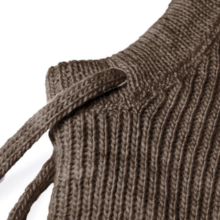 Close-up of the Hand Knit Cozy Hood in ribbed brown wool, featuring a drawstring threaded through a small opening, showcasing detailed texture and stitching against a white background.