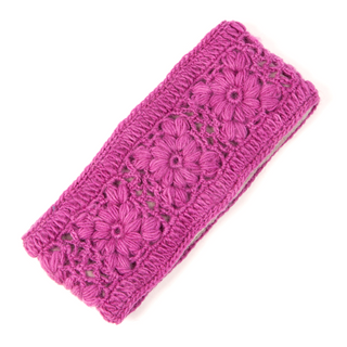 A handmade flower crochet wool headband in pink on a white background.