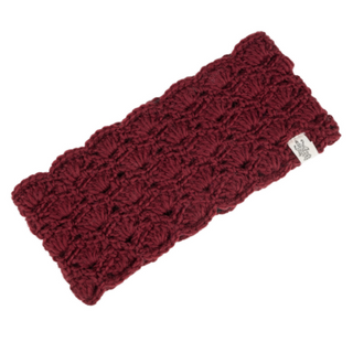 A maroon crocheted Lacey Headband with sherpa lining laid out flat on a white background.