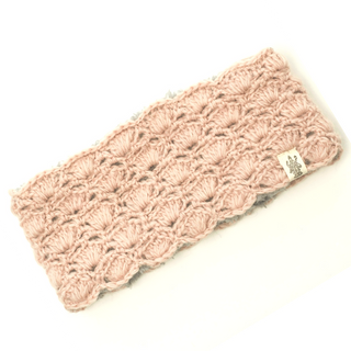 A Lacey Headband with a sherpa lining and a braided pattern, displayed on a white background.