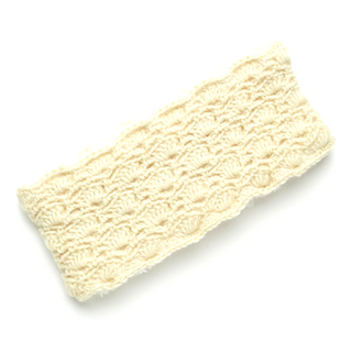Lacey headband with a cable pattern and sherpa lining, displayed on a white background.