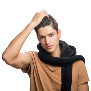 Sentence with Product Name: A young individual with a hand on their head, wearing a brown t-shirt and a Gucci Hood Scarf against a white background.
