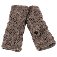A pair of Flower Hand Crochet Fingerless Gloves, handmade in brown wool with a delicate floral pattern and a thumb hole. The gloves are laid flat, slightly overlapping each other.
