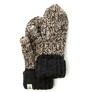 A single Ziggy Mitten, hand-knitted in Nepal, with a black and beige zigzag pattern and a solid black cuff.