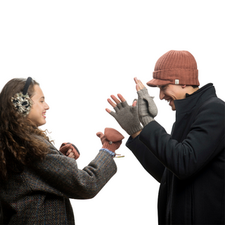 A man and a woman wearing Bryant Fingerless Gloves with Flap.