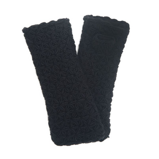 A pair of black fingerless I See Stars Merino Handwarmers with a textured pattern, laid out on a white background.