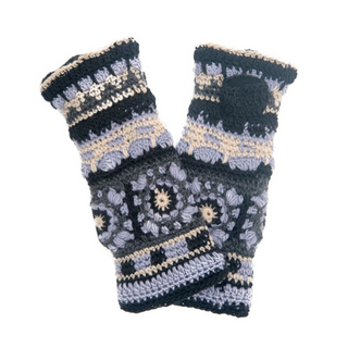 A pair of Dreams Crochet Handwarmers, handmade in Nepal, with a multi-patterned design in shades of black, white, and grey, isolated on a white background.