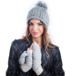 A young woman in a leather jacket and Speckle Knit Mittens.