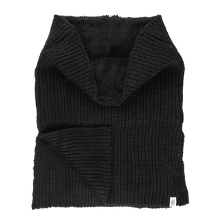Handmade in Nepal, this black Mick Neckwarmer features a wide ribbed pattern and a soft, plush lining, laid flat on a white background.