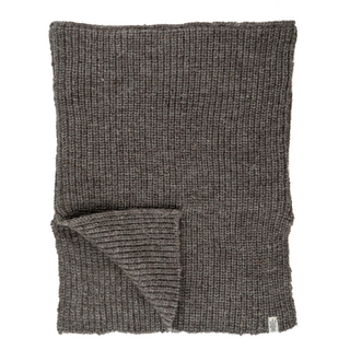 A flat-laid grey knitted Mick Neckwarmer with a ribbed pattern and a small white label on the bottom right corner.