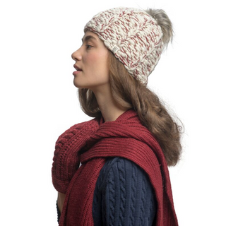 A woman wearing a knitted merino wool hat and Laurent Scarf.