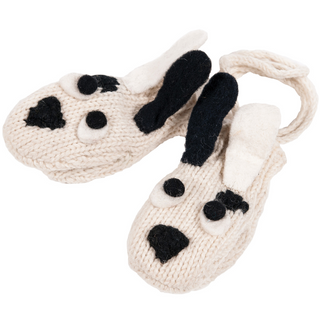 A pair of cozy, beige wool Puppy2 Mittens with black spots and ears, and stitched eyes, isolated on a white background.