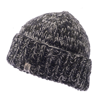 A Marbled rib fold beanie in black and white on a white background.