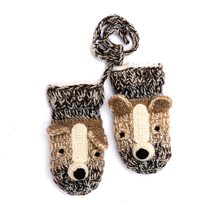 A pair of Crochet Chiwawa Mittens with a badger on them, sherpa lined for extra warmth.
