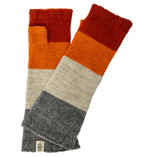 A pair of Colorblock handwarmers in a gradient from grey to burnt orange, displayed on a white background.