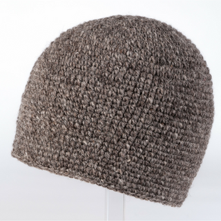 A grey wool Crochet Seed Beanie on a mannequin.