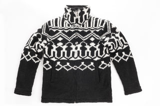 A black and white patterned People Pattern Jacket w/ Brass Zipper, handmade in Nepal, laid flat on a white background.