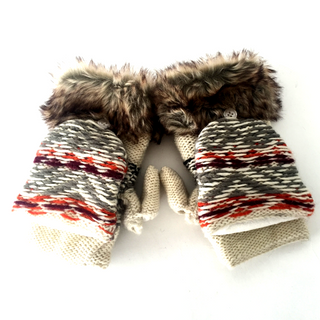 A pair of Opposite Pattern Fingerless Gloves w/ Flap handmade in Nepal with a colorful pattern and faux fur cuff laid out on a white background.