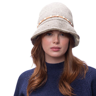 A woman wearing an Emily Sun hat.