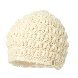 A cream-colored Good Vibes Beanie displayed on a white background.
