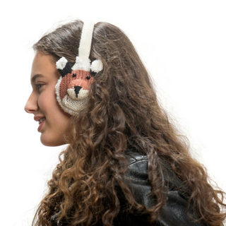 A young girl in profile with curly hair, wearing hand-knit Fox Earmuffs.