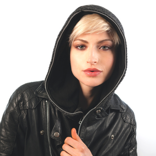 A person with short blonde hair wearing a black leather jacket with a Zipper Hood, looking at the camera with a neutral expression.