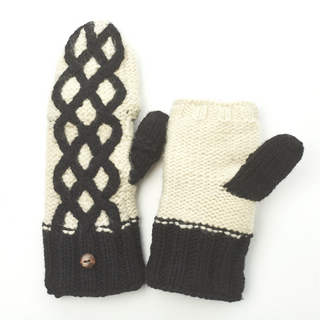 A pair of Billie Mittens with a cream color and black details, including a criss-cross pattern on one and a solid color patch on the thumb of the other.